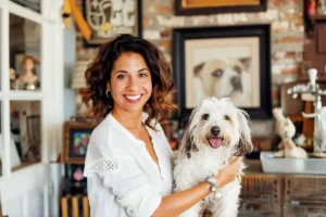 person, dog, companion dog, smiling, indoor